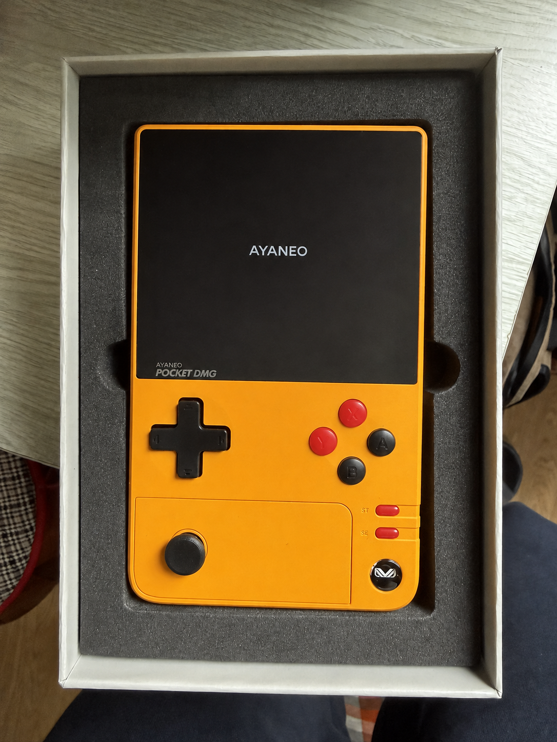 My orange AYANEO POCKET DMG in its box