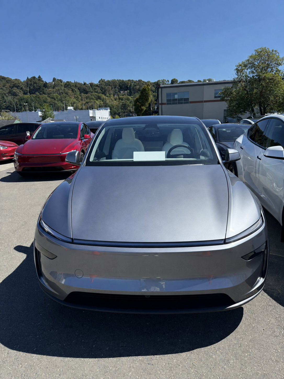 My silver Tesla Model Y at Tesla